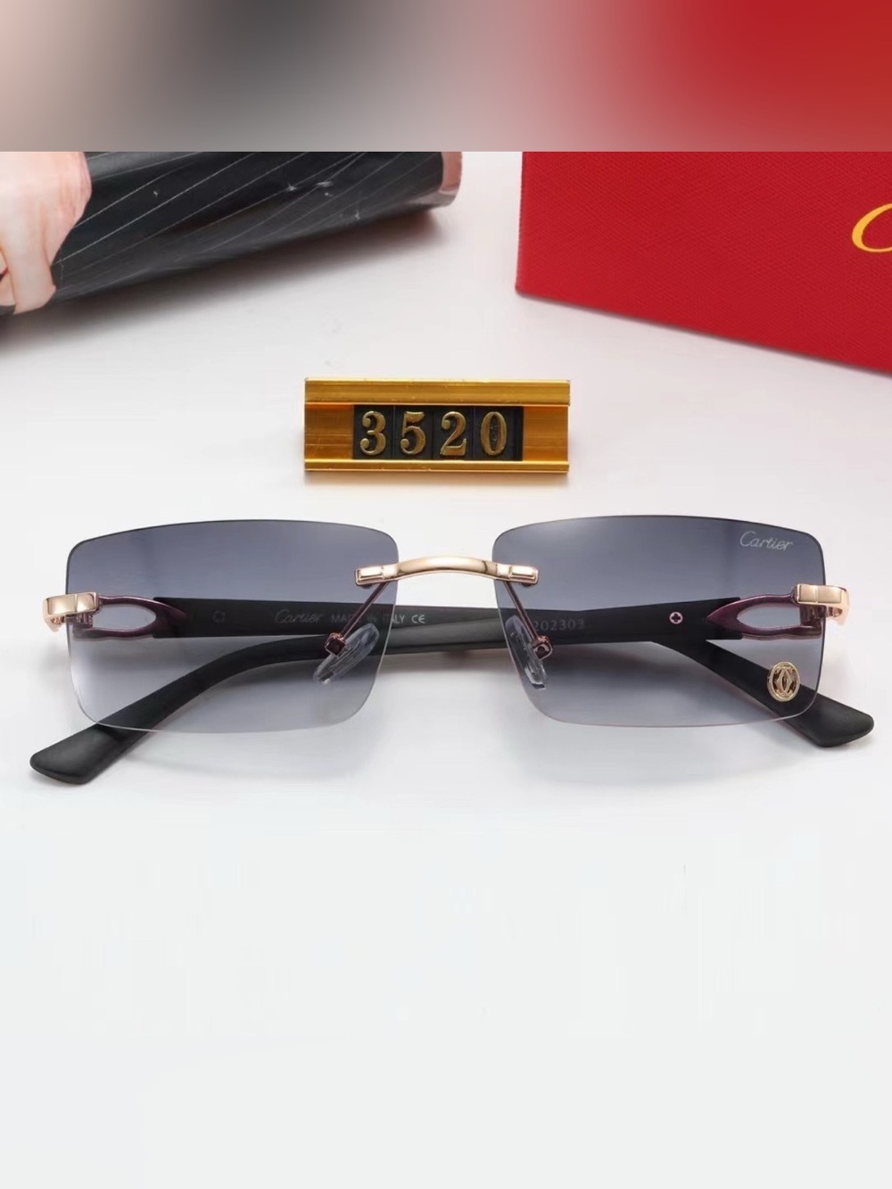 Cartier Men's Rimless Sunglasses with Gray Gradient Lenses and Gold Accents
